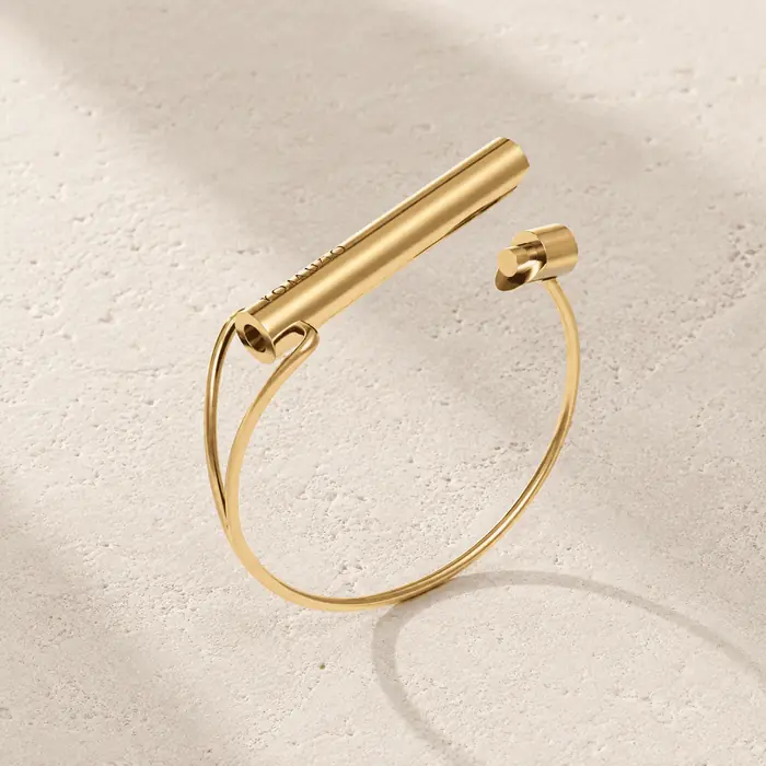 Komuso Cuff Shift bracelet in gold.